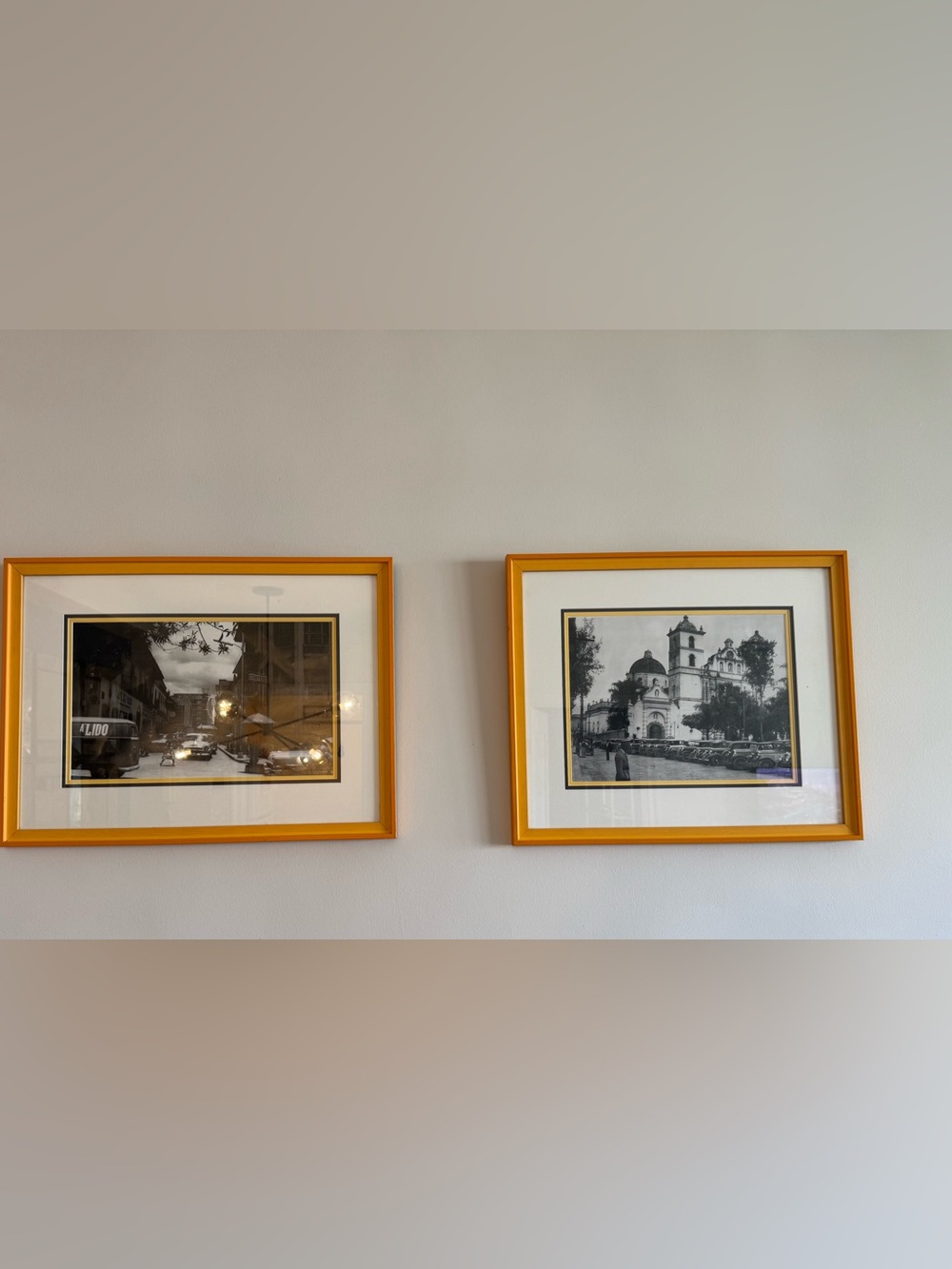 Set of Three Yellow/Orange Picture Frames with Black & White Prints